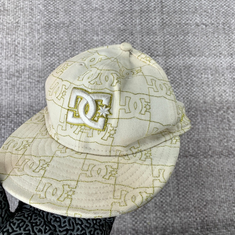 DC Shoes New Era 59FIFTY Fitted Hat Size 7 Cream Gold Monogram All Over Print
